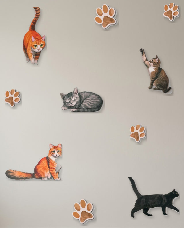 Cats wooden wall art set arranged as on the ledge — The cats lined up along a shelf, watching the room.