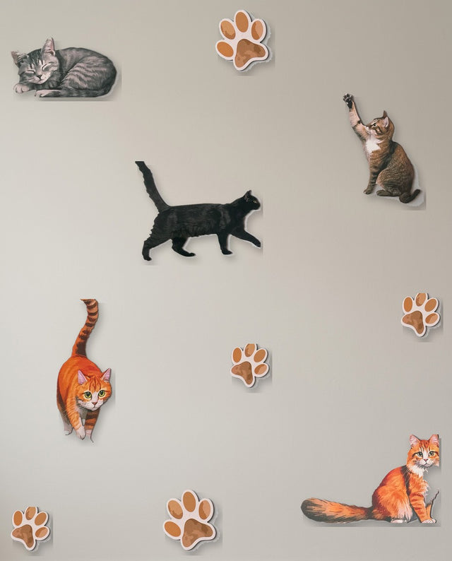 Cats wooden wall art set arranged as curled up — A small cluster in a reading nook, like cats napping in a sunny corner.