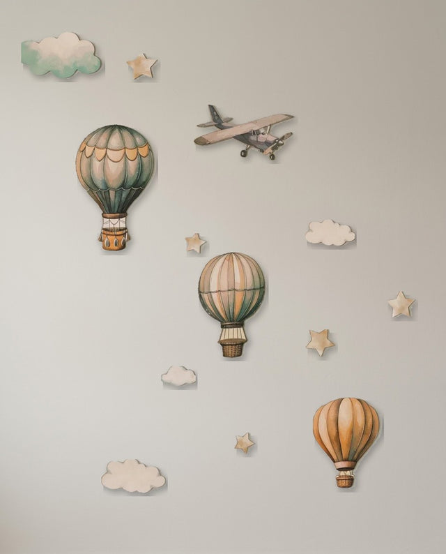 Hot Air Balloon wooden wall art set arranged as drifting by — A smaller cluster of balloons and clouds for a quiet corner.
