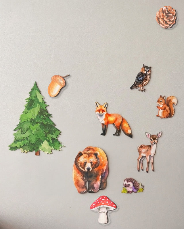 Woodland wooden wall art set arranged as deep in the forest — The full woodland scene, gathered beneath the fir tree.